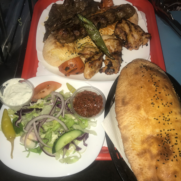 Chicken and sheesh kebab, pitta bread and salad