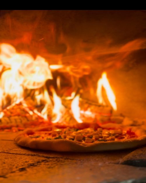 Pizza in a wood fired oven