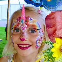 A young girl with her facepainted